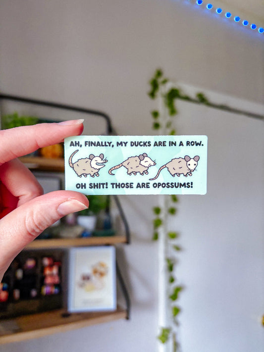 Ducks in a Row Opossum Sticker
