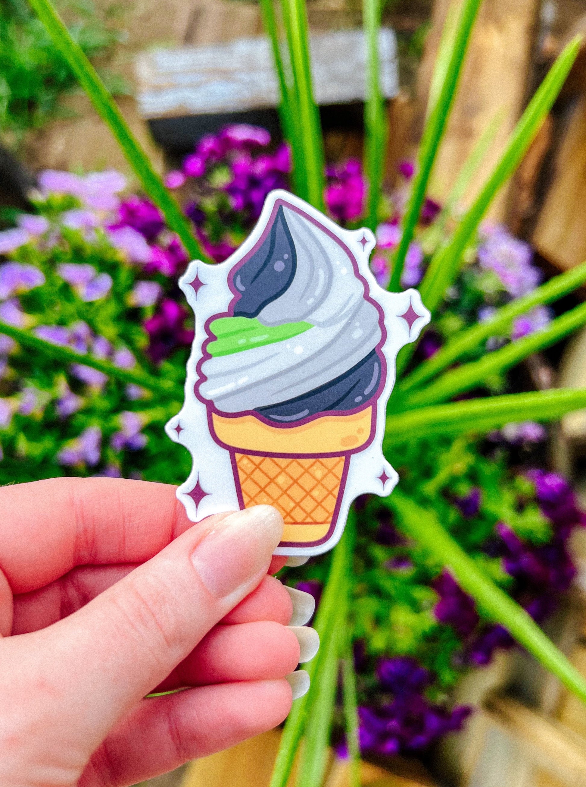 Cute ice cream cone sticker with stars around it. In the colors of the Agender PRIDE Flag